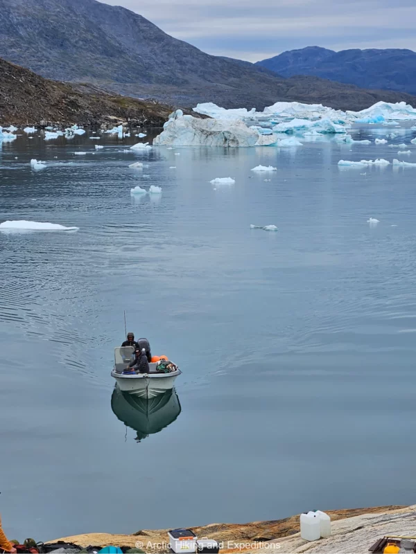 Luggage boat arriving in the Serlilik Fjord East Greenland