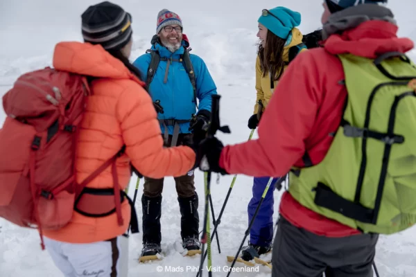 Snowshoers on a break in East Greenland