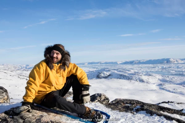 Taking break on snowshoe tour