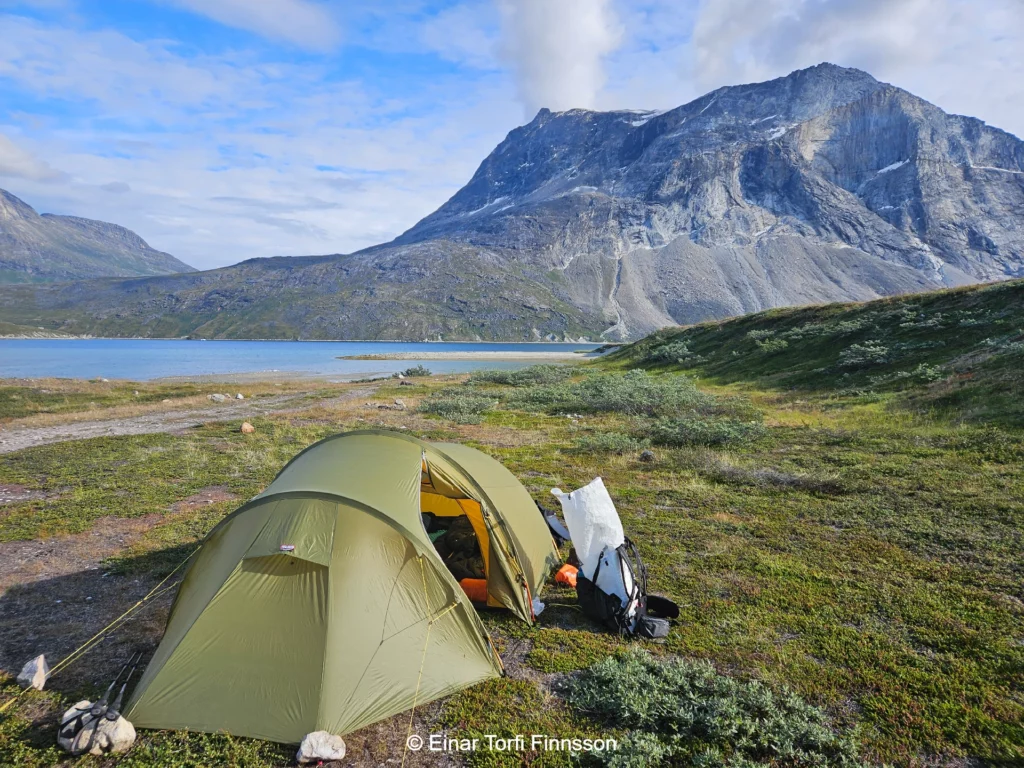 Trekking in Nuuk fjord West Greenland. Tranquility at a beautiful campsite,
